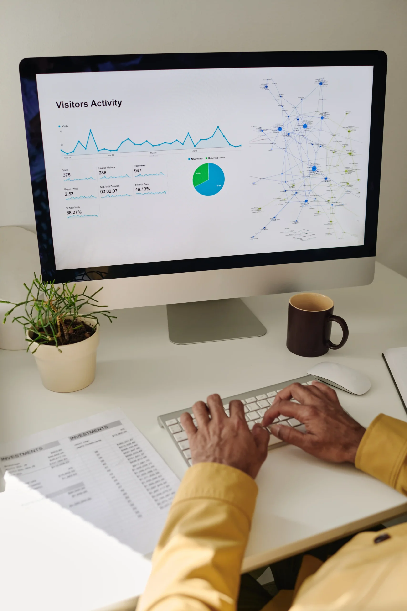 monitoring data analytics on a desktop screen
