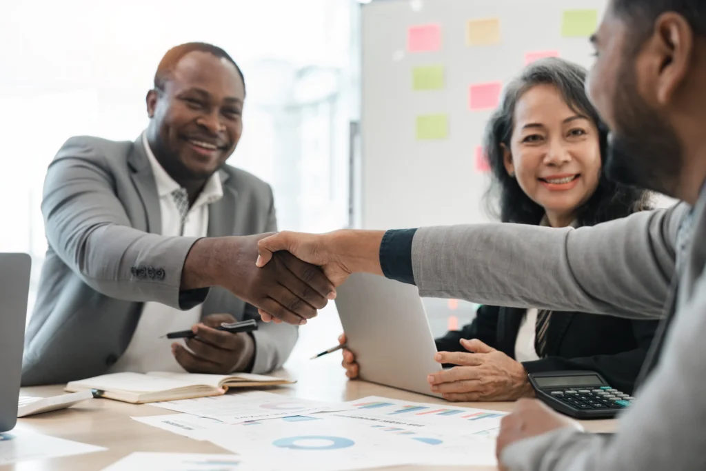A client and a professional shaking hands