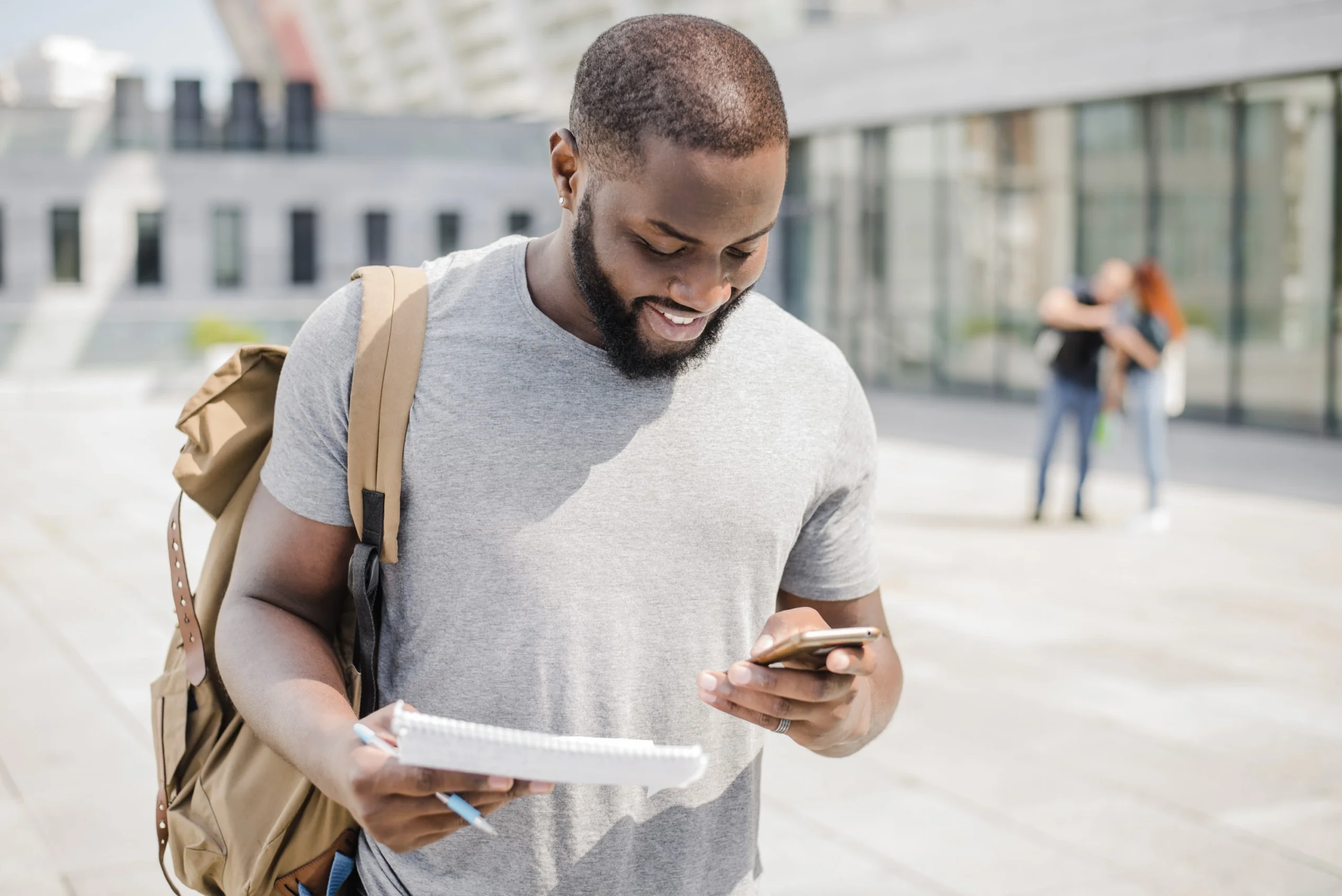 cheerful user using phone